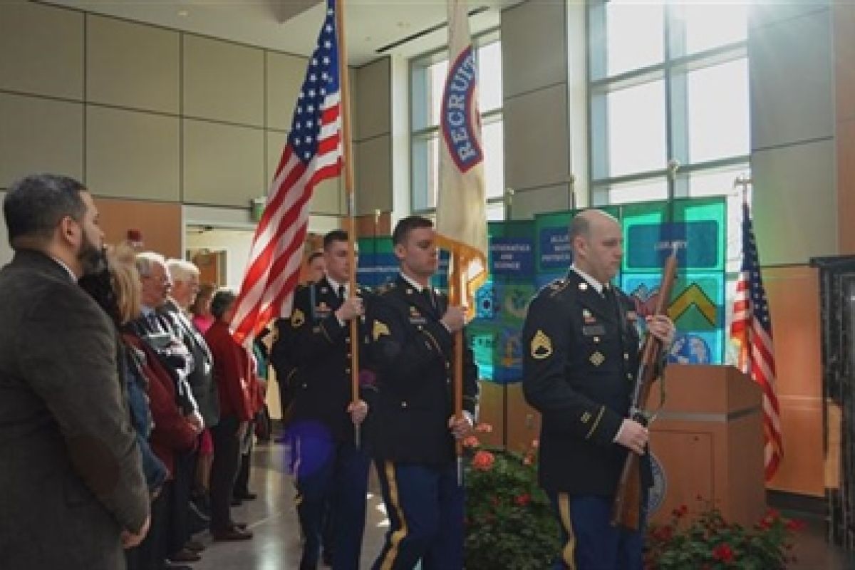 Color Guard Procession, Patriotic Sing-Along among Highlights of All College Meeting