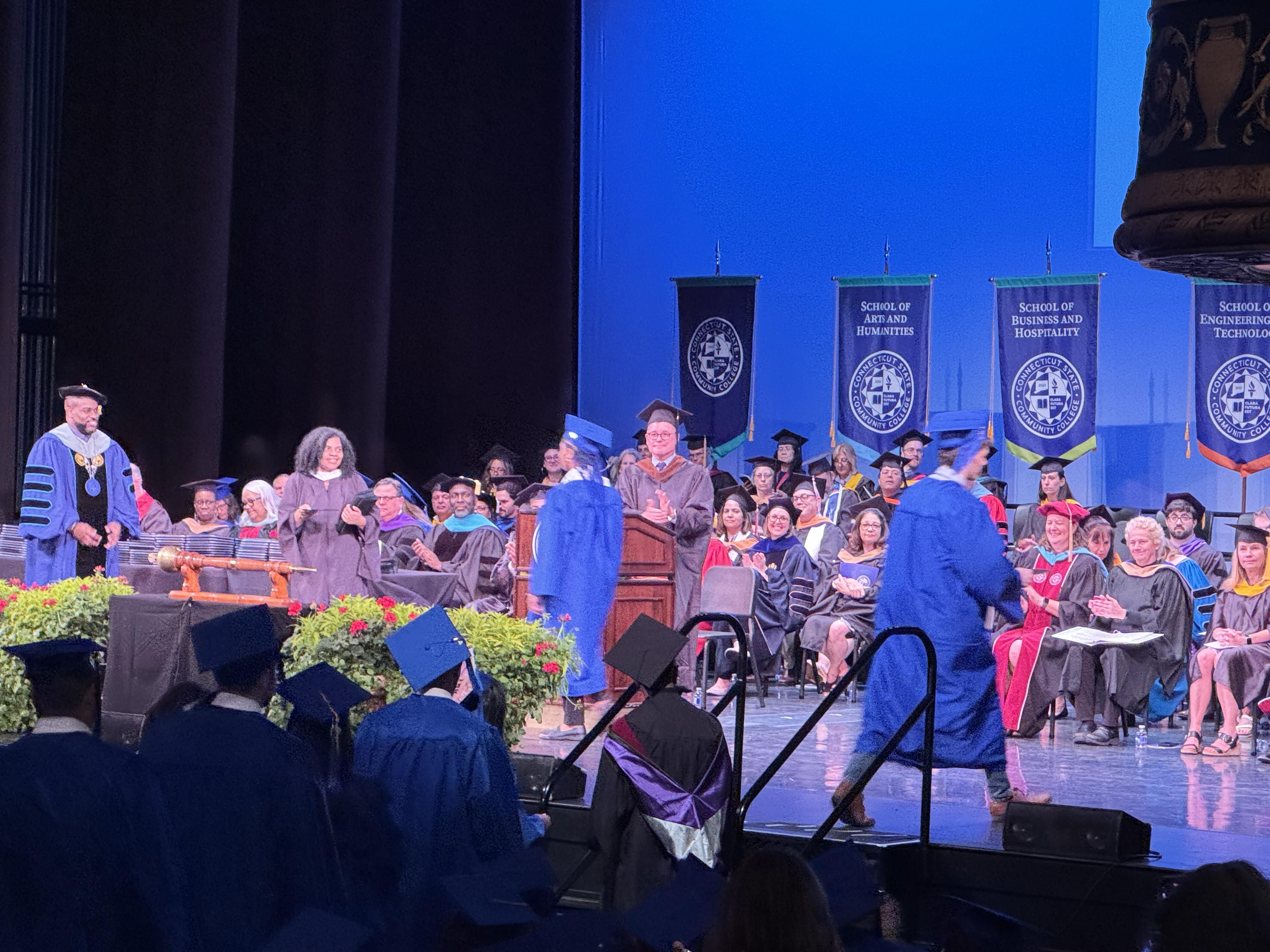 Students Walking  on Stage for Degree